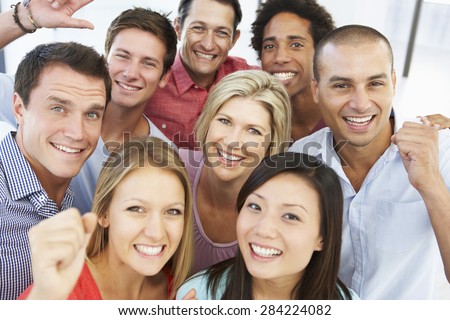 Elevated View Of Happy And Positive Business People In Casual Dress
