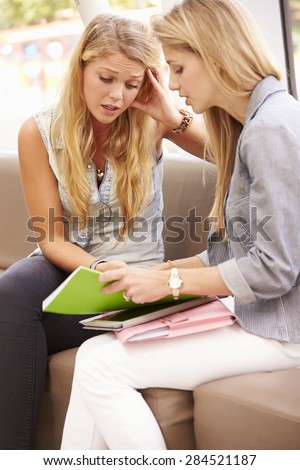 Depressed College Student Talking To Counselor