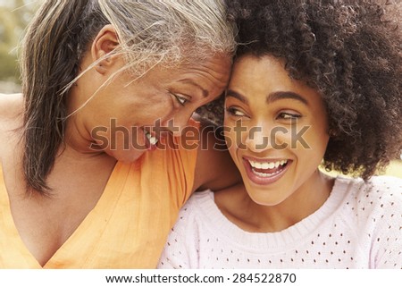 Portrait Of Mother With Adult Daughter In Park