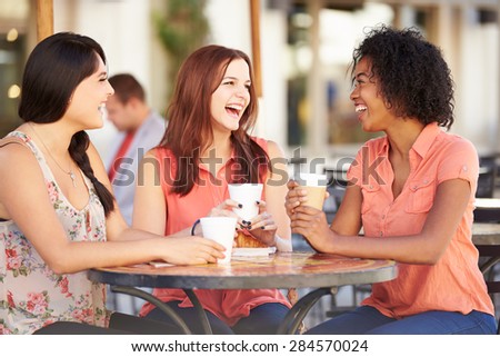 Three Female Friends Meeting In Cafx81_