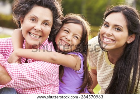 Grandmother With Granddaughter And Mother In Park