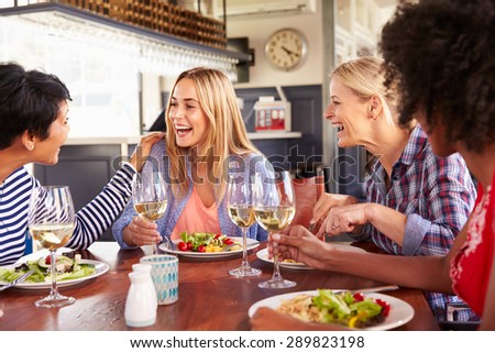 Female friends eating at a restaurant