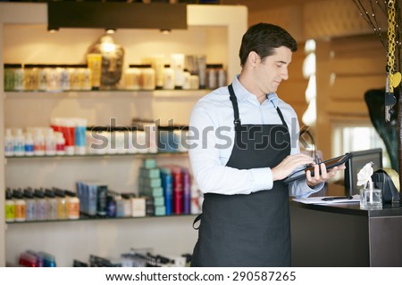 Portrait Of Male Sales Assistant In Beauty Product Shop