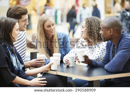 Group Of Friends Meeting In Shopping Mall Cafx81_