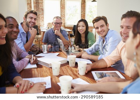 Group Of Office Workers Meeting To Discuss Ideas
