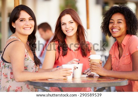 Three Female Friends Meeting In Cafx81_