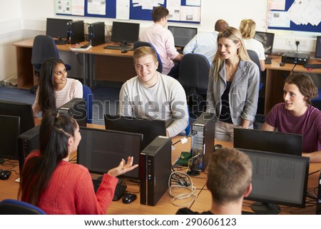 College Students At Computers In Technology Class