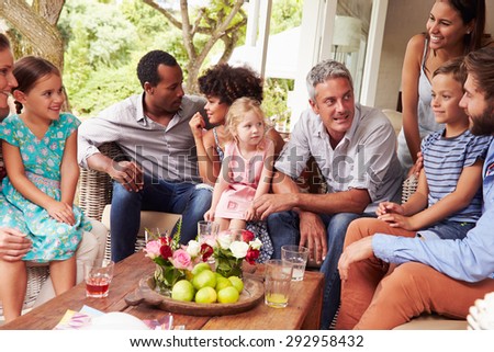 Family gathering in a conservatory
