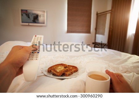 Point Of View Image Of Man In Bed Watching Television