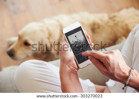 Close Up Of Woman Listening To Music Smartphone At Home