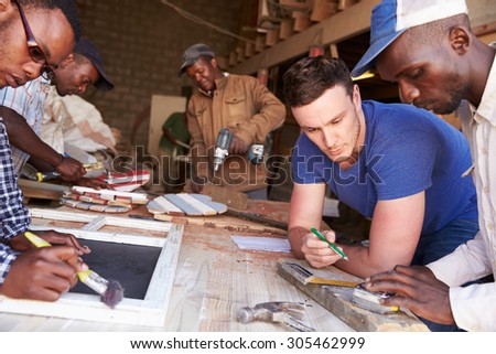 Men at work in a carpentry workshop, South Africa, close up