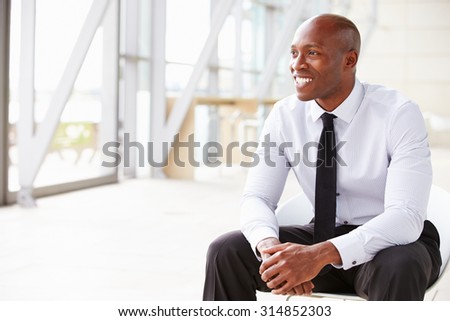 African American businessman looking away, horizontal
