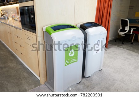 Recycling bins in a modern office kitchen