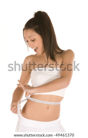 young caucasian brunette measure her hips showing diet success