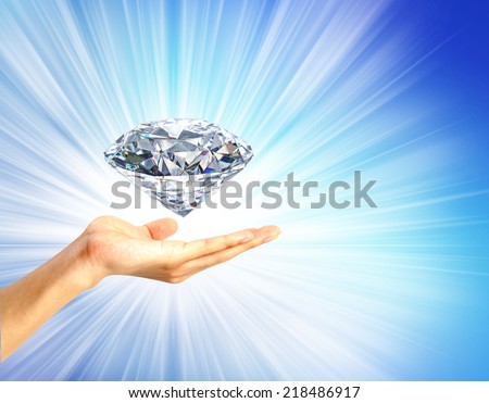 bright picture of  hand with big diamond. Concept most precious beauty.