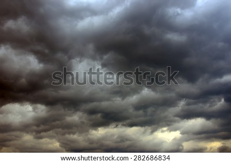 Strong dark gray dramatic sky with large clouds