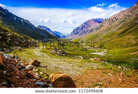 Mountain valley landscape. Mountain rocks in mountain valley panorama. Mountain valley view