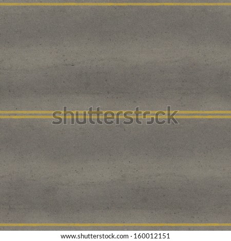 Seamless texture of grey, slightly worn road with yellow stripes.