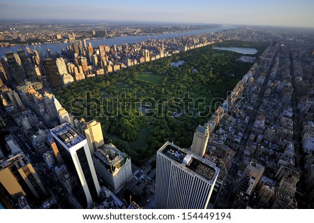 Central Park Aerial View, Manhattan, New York; Park Is Surrounded By Skyscraper