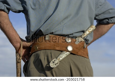Gaucho, Argentinian cowboy, with silver knife and leather belt