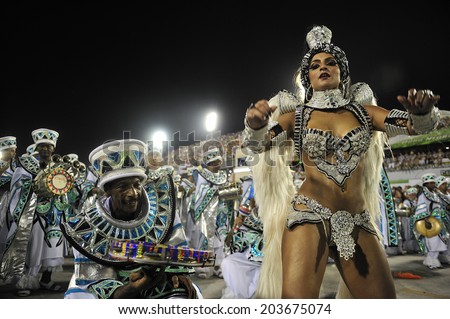 RIO DE JANEIRO, RJ /BRAZIL - February 11, 2013: World\'s famous carnival in Rio de Janeiro, samba school parading in Sambadromo, the carnival stadium, with 90000 spectators.