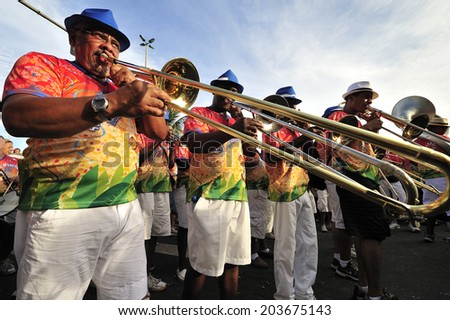 RIO DE JANEIRO, BRAZIL - FEBRUARY 08, 2013: Street Carnival in Rio de Janeiro, crowd of people celebrate on the street with Blocos, individual groups who plan the parties with bands and samba music.