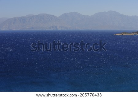 Aegean Sea with deep blue water, coast of Crete in  Mediterranean sea, island of Crete, Greece
