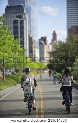 New York City, USA, - May. 18. 2014: Bike riders along Westside highway bike lane, Manhattan, New York, USA