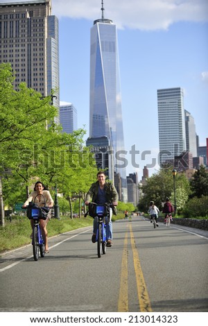 New York City, USA, - May. 18. 2014: Bike riders along Westside highway bike lane, Manhattan, New York, USA