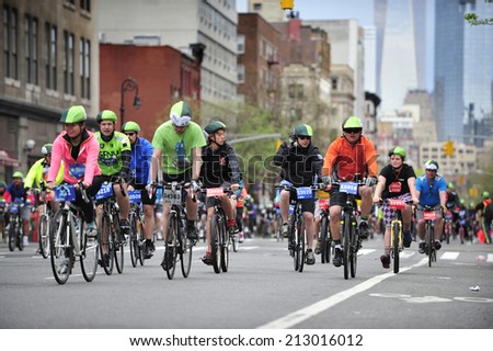 New York City, USA, - May. 4. 2014: people riding the bike along 6th Avenue at Five Boro Bike Tour, New York, USA