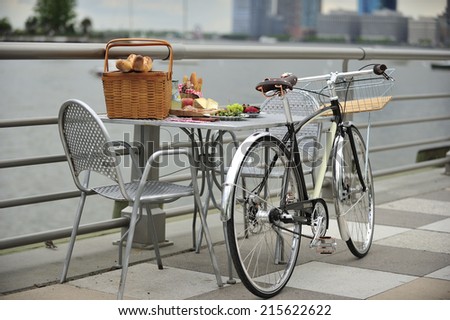 New York City, USA, - May. 18. 2014: Bicycle and picnic lunch by Hudson River, Tribeca, New York, USA