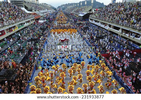 RIO DE JANEIRO, RJ /BRAZIL - March 8, 2014: World\'s famous carnival in Rio de Janeiro, samba school parading in Sambadromo, the carnival stadium, with 90000 spectators.