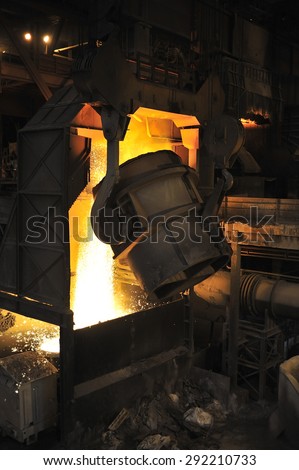 smelting of the metal in the foundry at steel mill