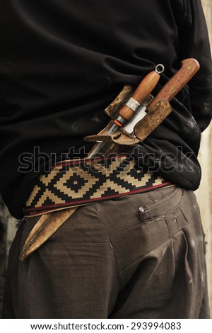 Gaucho, traditional cowboy in Latin America with silver knife and leather belt