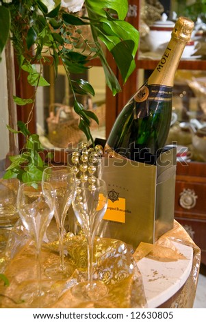 champagne and glasses in gold