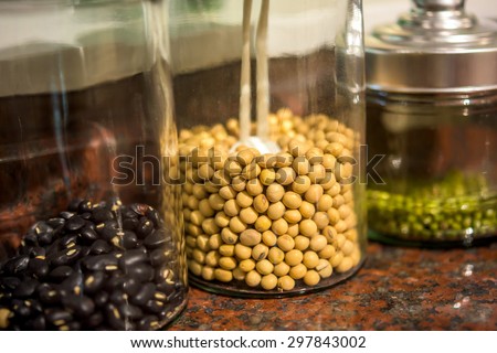 Dry beans stored in glass canisters in the kitchen