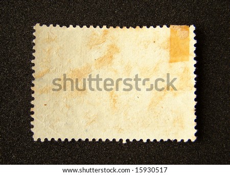 Blank postage stamp on black background.