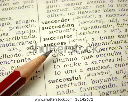 'success' word in English-Spanish dictionary with pencil