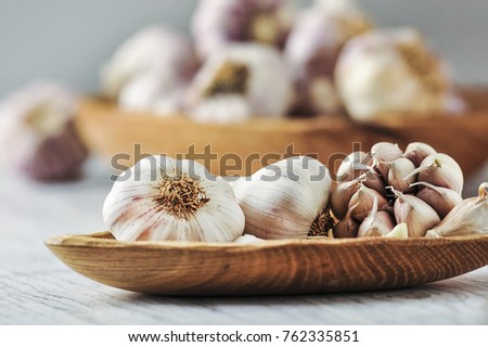 Garlic Cloves, Garlic bulb in wooden bowl. Garlic healthy food