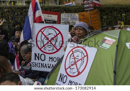 BANGKOK, THAILAND - JAN 24, 2014: Anti-government protesters at Phatumwan junction area, nearby the Siam Center and the MBK shopping mall, for shut down the city and force the resignation of PM.