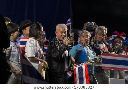 BANGKOK, THAILAND - JAN 24, 2014: Pramote Maiklad, former director-general of Irrigation Department and Lersak Riewtrakulpaibul, Deputy Permanent Secretary of Agriculture and Cooperatives on the protest stage at Pathumwan.
