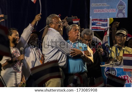 BANGKOK, THAILAND - JAN 24, 2014: Pramote Maiklad (blue shirt), former director-general of Irrigation Department and Suthep Thaugsuban, the PDRC\'Â?Â?s Secretary-General on the protest stage at Pathumwan.