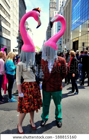 NYC - April 20, 2014: Two people wearing original flamingo hats at the annual Easter Parade on Fifth Avenue April 20, 2014