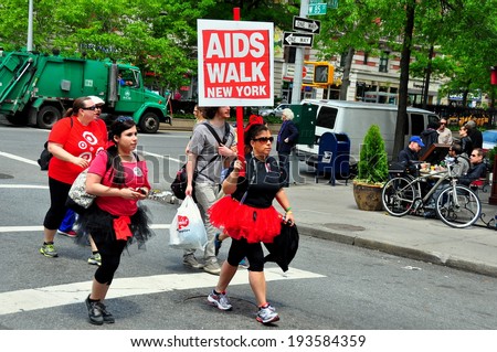 NYC - May 18, 2014:  Two women wearing ballet tutus marching in the annual AIDS WALK NYC 2014 walkathon raising money to fight AIDS