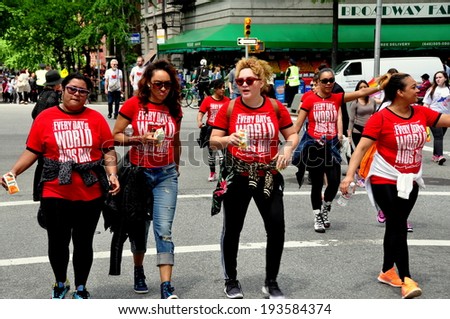 NYC - May 18, 2014:  Group of women wearing Every Day is World AIDS Day tee-shirts participating in the annual AIDS WALK NYC 2014