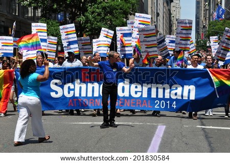 NYC - June 29, 2014:  New York State Attorney General Eric Schneiderman marching with this group at the 2014 Gay Pride Parade on Fifth Avenue