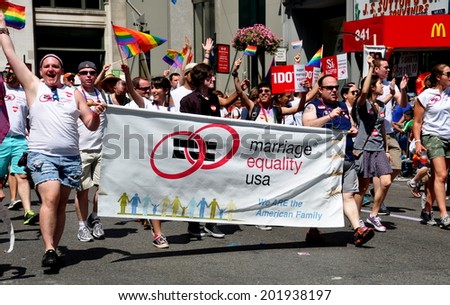 NYC - June 29, 2014:  Marriage Equality USA group marching in the 2014 Gay Pride Parade on Fifth Avenue
