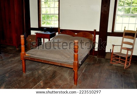 Hancock, Massachusetts - September 17,2014:  A simple bed in the 1820 Hired Men\'s Shop at the Hancock Shaker Village