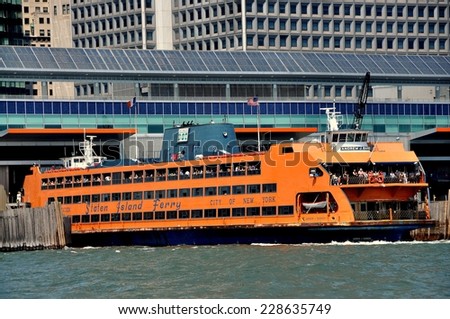 NYC - August 4, 2011:  The Andrew J. Barbieri Staten Island Ferry leaving its berth at the lower Manhattan ferry terminal to cross New York harbor on its journey to Staten Island