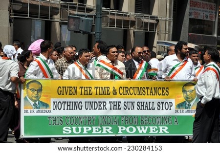 New York City - August 15, 2009:  Men marching with a banner promoting India as a super power marching in the annual India Day Parade on Madison Avenue